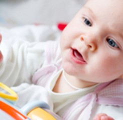 Baby playing with toy